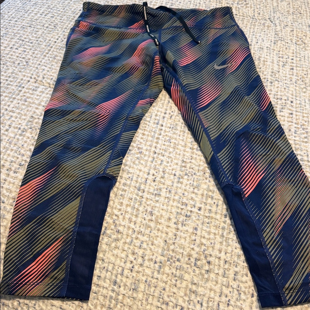 Nike Blue and Pink Patterned Leggings
Calf length